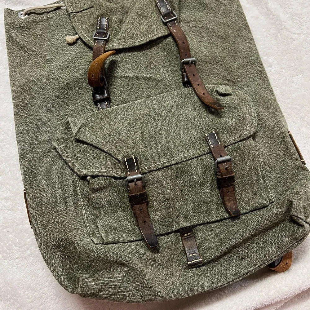 Swiss army inspired back pack leather accents